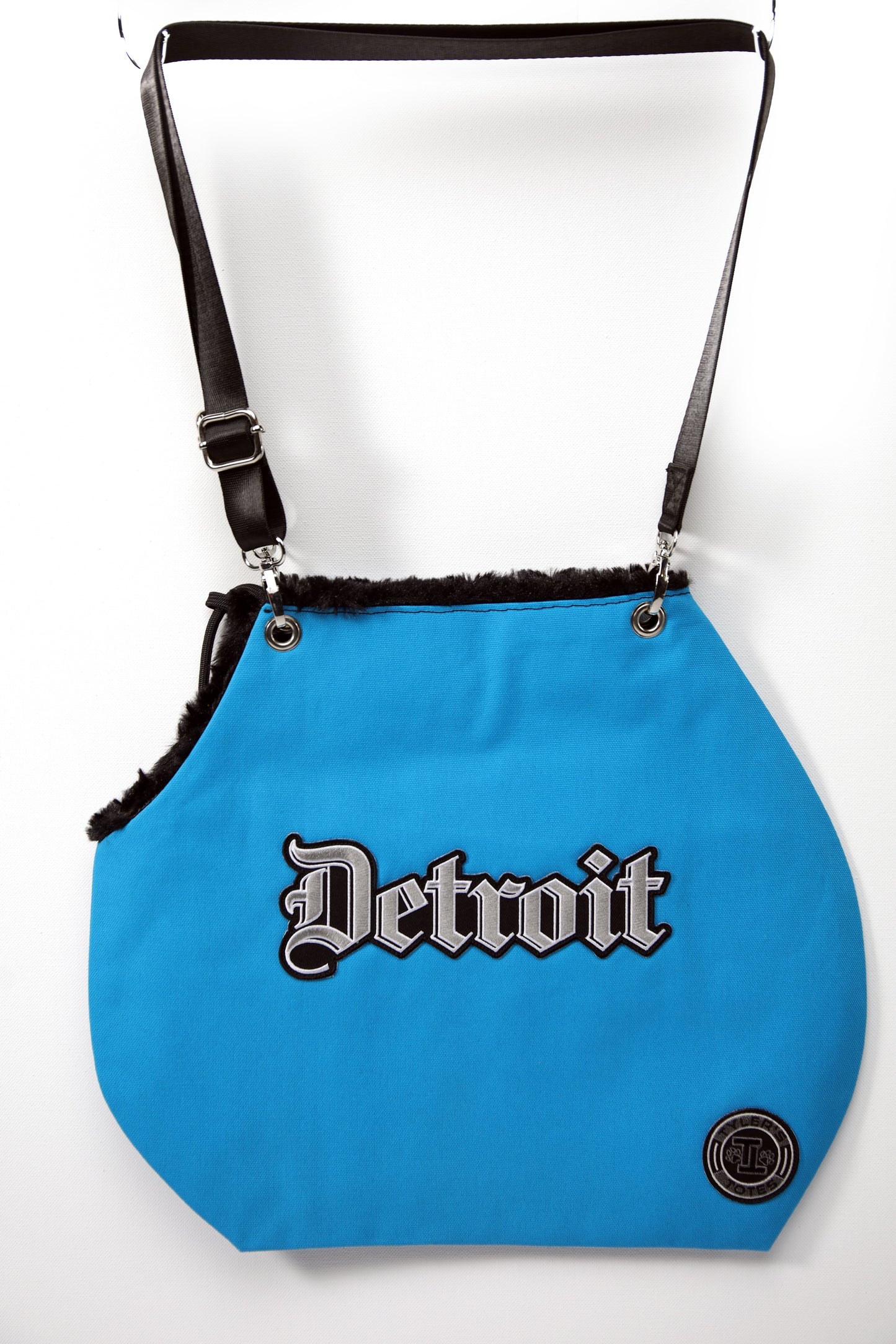 Blue bag with 'Detroit' text on a white background